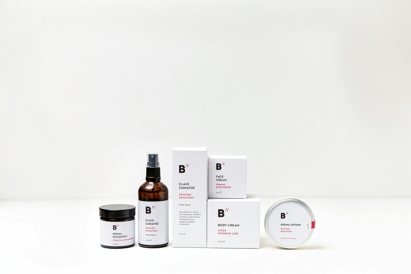 Skincare products arranged neatly on a white background.
